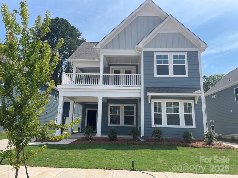 Front exterior of a new home in Arbor Village, Matthews, NC, highlighting curb appeal (Image 2). Front exterior of a new home in Arbor Village, Matthews, NC, highlighting curb appeal (Image 2).