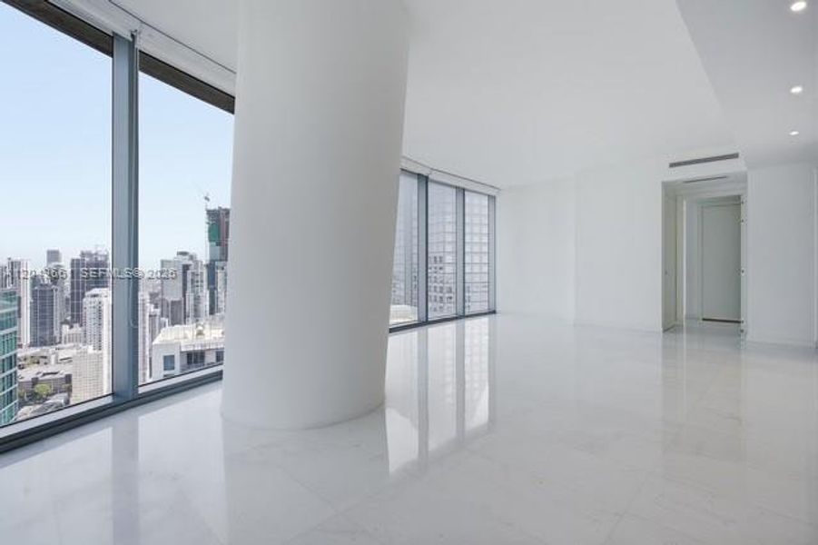 Spacious, unfurnished interior of a new home in Aston Martin Residences, Miami (Image 18).