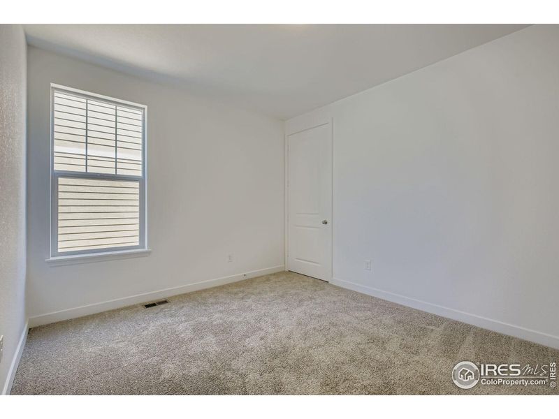 Spacious, unfurnished interior of a new home in Riano Ridge, Loveland (Image 10).