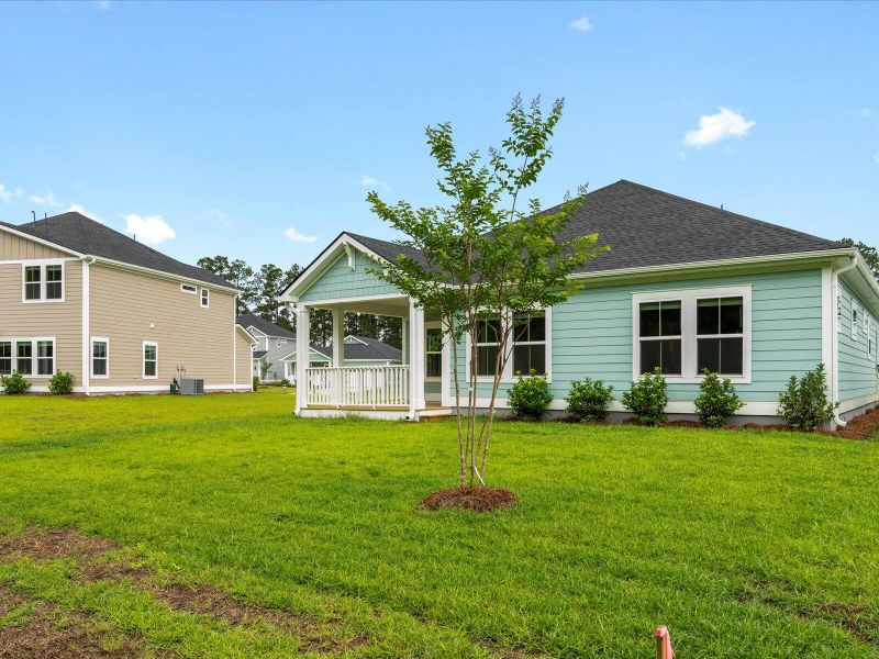 Exterior details and patio area of a home in The Coves at Lakes of Cane Bay, Summerville (Image 25).