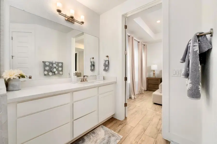 Primary Bathroom offers 2 seperate vanities.