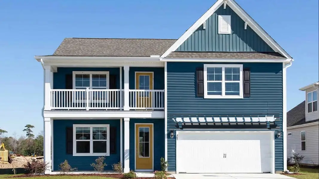 Front exterior of a new home in Surfside Landing, Hubert, NC, highlighting curb appeal (Image 1). Front exterior of a new home in Surfside Landing, Hubert, NC, highlighting curb appeal (Image 1).