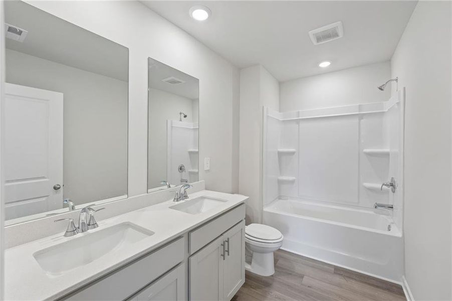 Furnished interior view inside a new home in Northwoods at Mirror Lake, Villa Rica (Image 9).