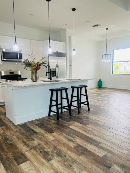 Furnished interior view inside a new home in , Port Charlotte (Image 4). Furnished interior view inside a new home in , Port Charlotte (Image 4).