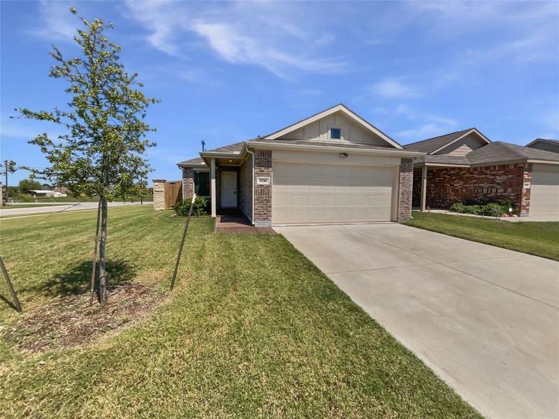 Front exterior of a new home in , Forney, TX, highlighting curb appeal (Image 2).