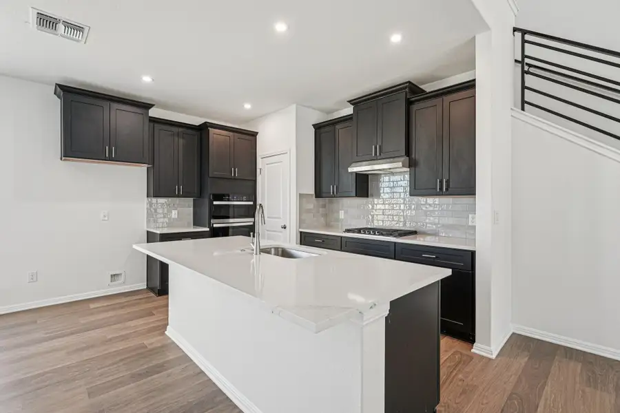Furnished interior view inside a new home in Porter Country, Buda (Image 7).