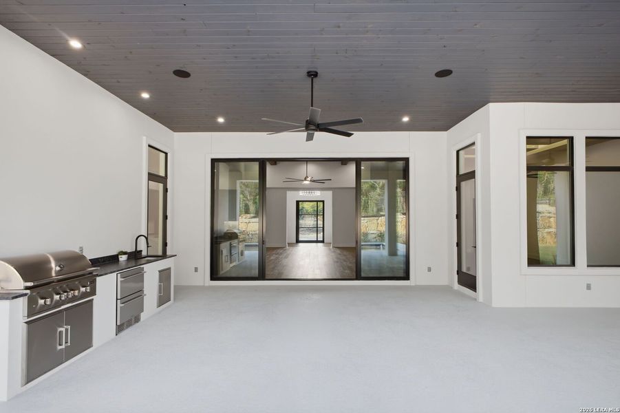 Exterior details and patio area of a home in , San Antonio (Image 36).