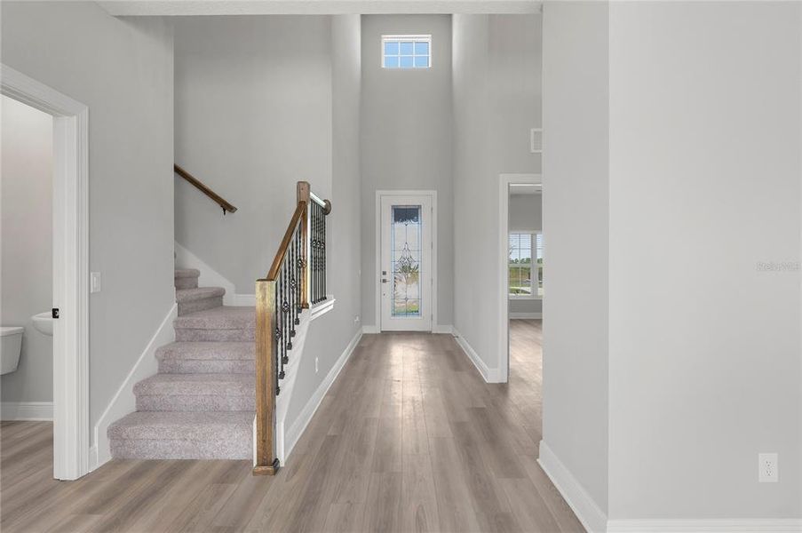 Spacious, unfurnished interior of a new home in Gum Lake Preserve, Lake Alfred (Image 16).