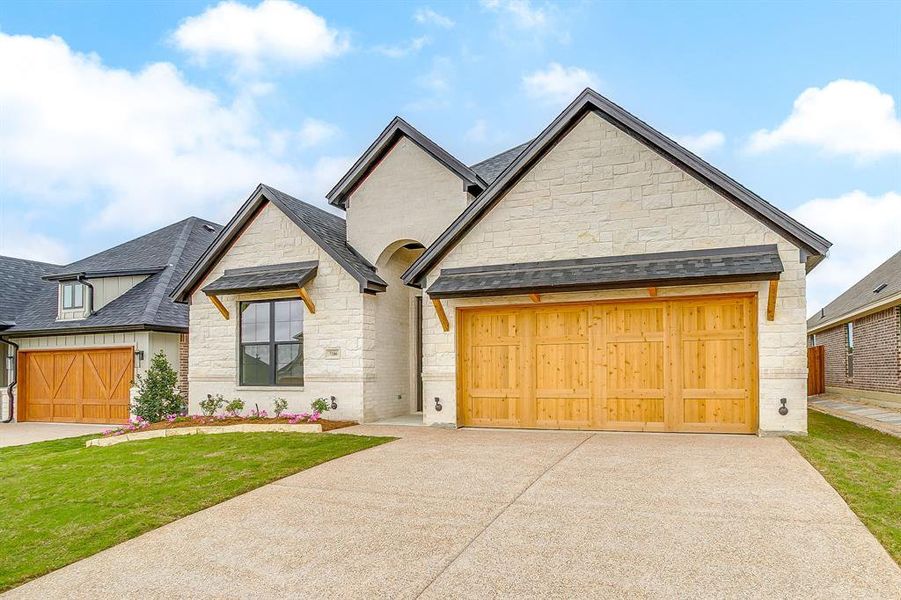 Front exterior of a new home in , Benbrook, TX, highlighting curb appeal (Image 22).