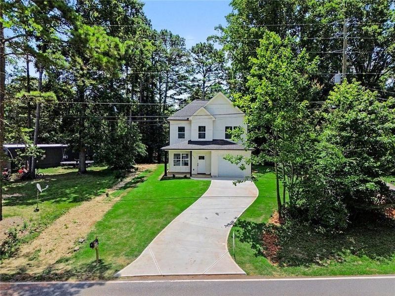Front exterior of a new home in , Gainesville, GA, highlighting curb appeal (Image 21).