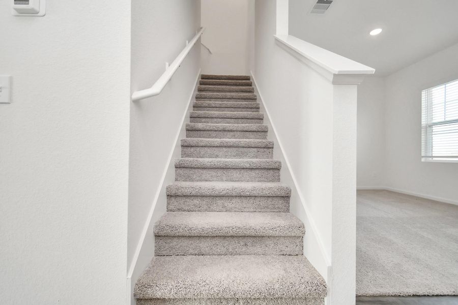 Spacious, unfurnished interior of a new home in Sunterra, Katy (Image 26).