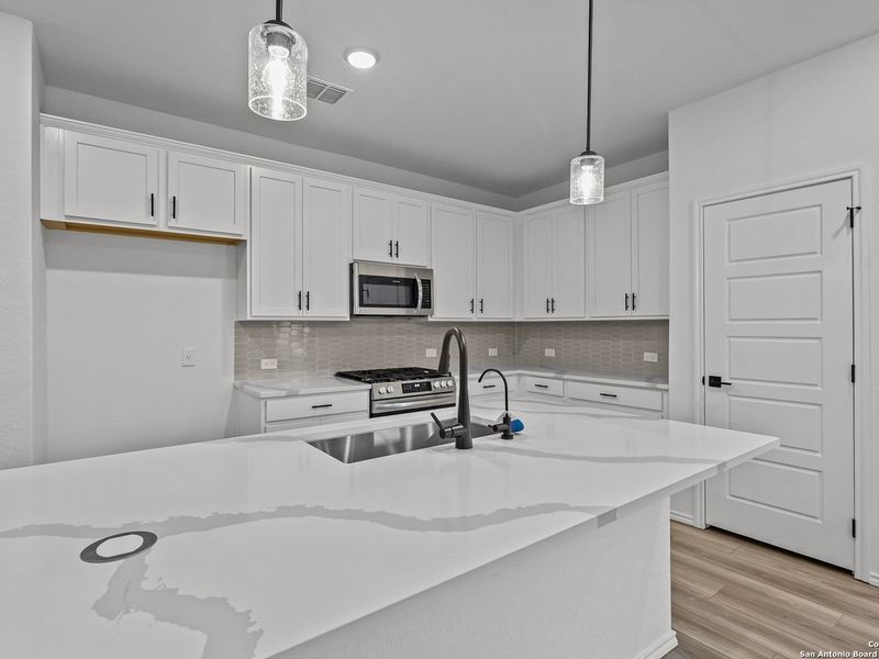 Furnished interior view inside a new home in Horizon Pointe, San Antonio (Image 8). Furnished interior view inside a new home in Horizon Pointe, San Antonio (Image 8).