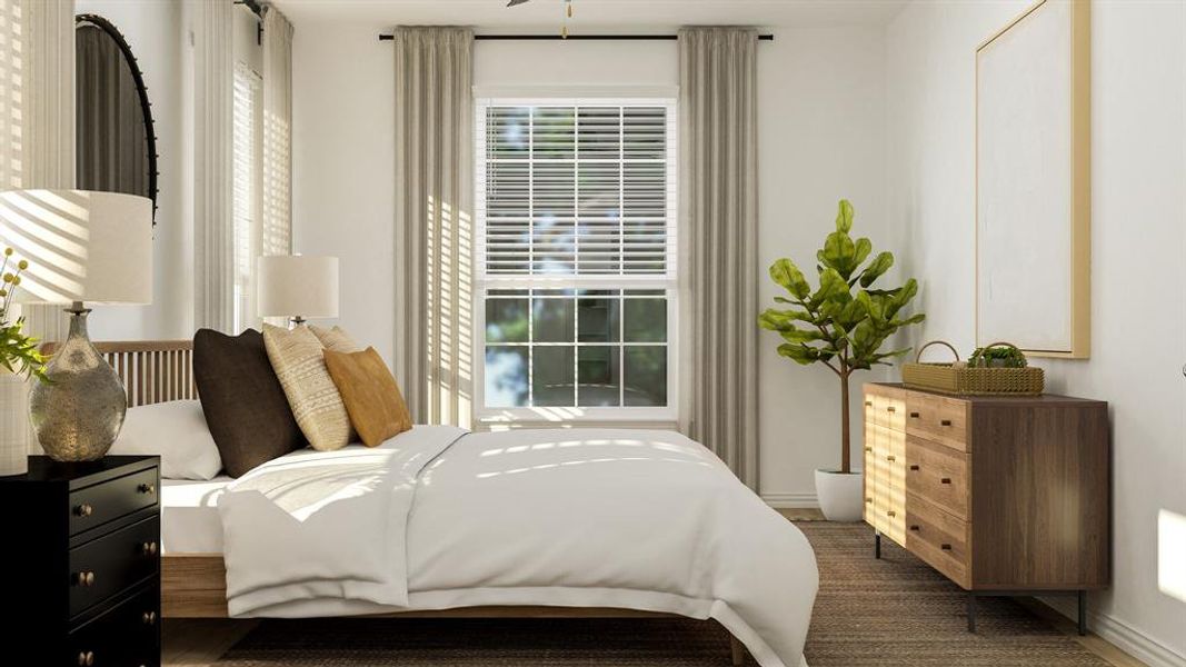 Bedroom featuring multiple windows