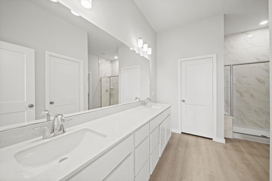 Furnished interior view inside a new home in Sunterra Lakes, Brookshire (Image 7).