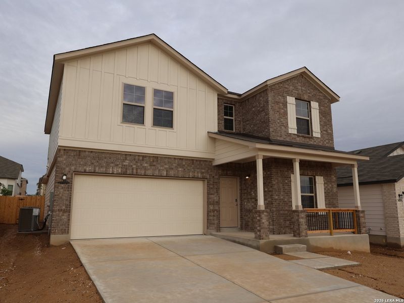 Front exterior of a new home in Mesquite Ridge, San Antonio, TX, highlighting curb appeal (Image 19). Front exterior of a new home in Mesquite Ridge, San Antonio, TX, highlighting curb appeal (Image 19).