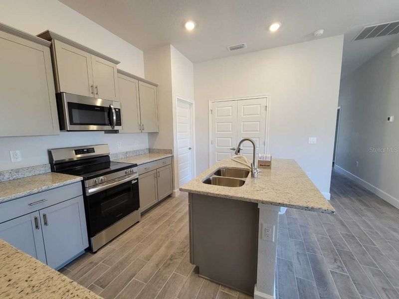 Furnished interior view inside a new home in Ocala Crossings South, Ocala (Image 4).