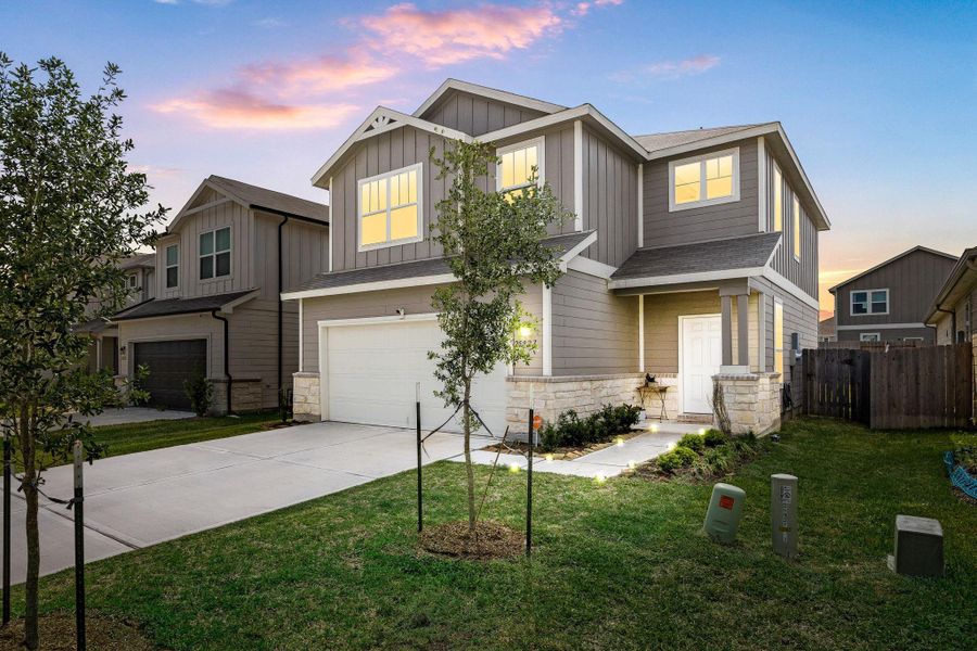 Front exterior of a new home in Decker Farms, Magnolia, TX, highlighting curb appeal (Image 22). Front exterior of a new home in Decker Farms, Magnolia, TX, highlighting curb appeal (Image 22).