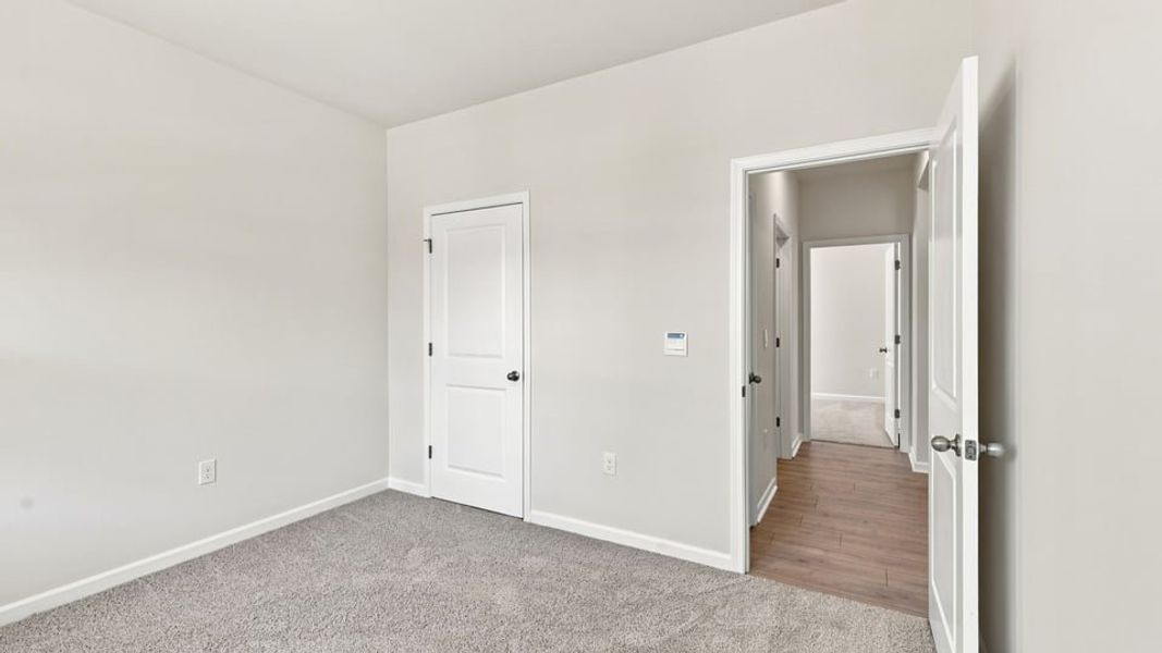 Spacious, unfurnished interior of a new home in Hunters Ridge, Woodruff (Image 20).