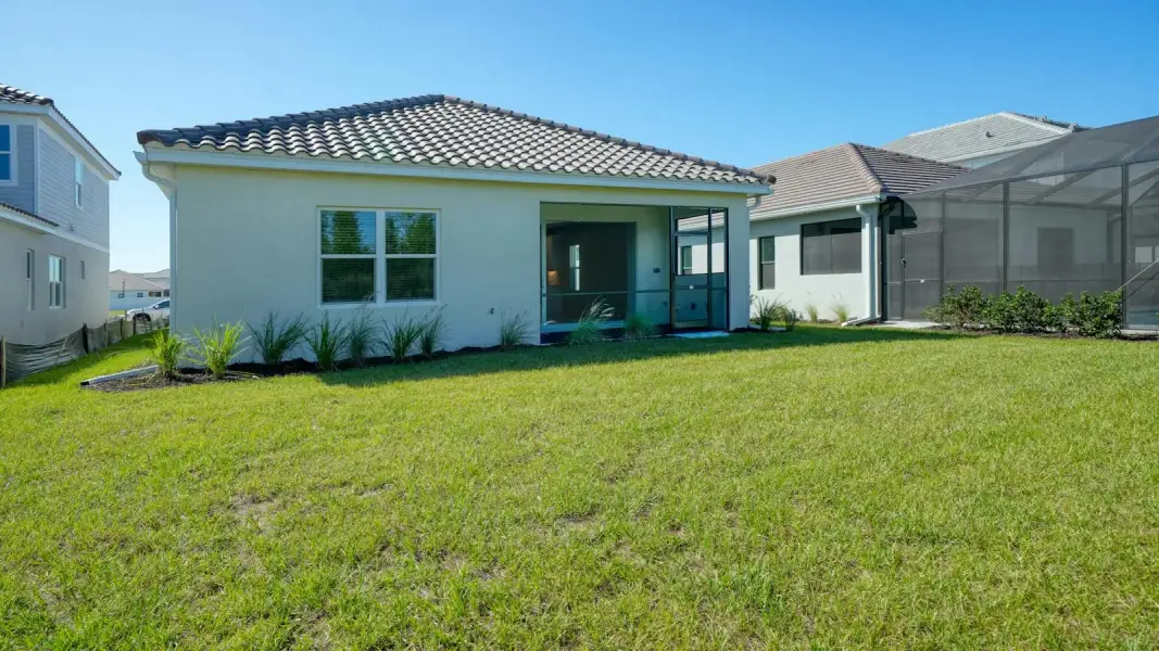 Exterior details and patio area of a home in Windward Real Estate and Homes for Sale in Sarasota, FL - Neal Communities, Sarasota (Image 27). Exterior details and patio area of a home in Windward Real Estate and Homes for Sale in Sarasota, FL - Neal Communities, Sarasota (Image 27).