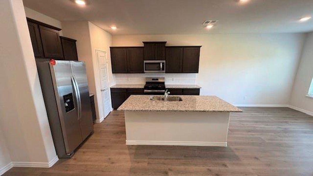 Furnished interior view inside a new home in Fireside by the Lake, Garland (Image 7).