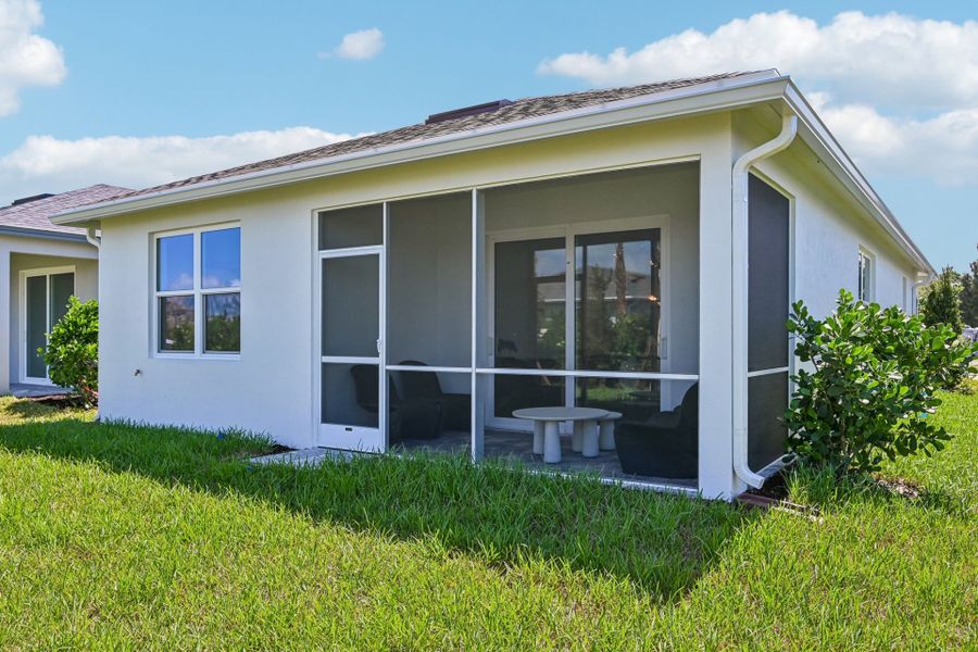 Exterior details and patio area of a home in Harbor Isle, Vero Beach (Image 29).