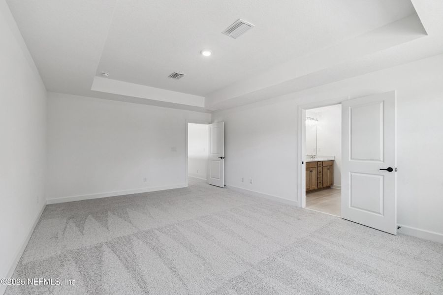 Spacious, unfurnished interior of a new home in Evergreen Island at Silverleaf - Classic, St. Augustine (Image 21).