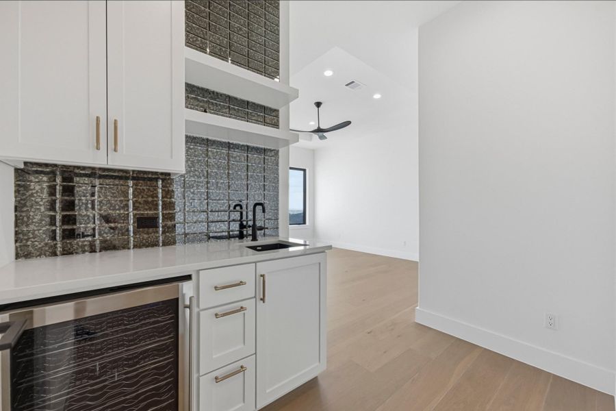 Downstairs Castia with beverage bar and sink for your guests!