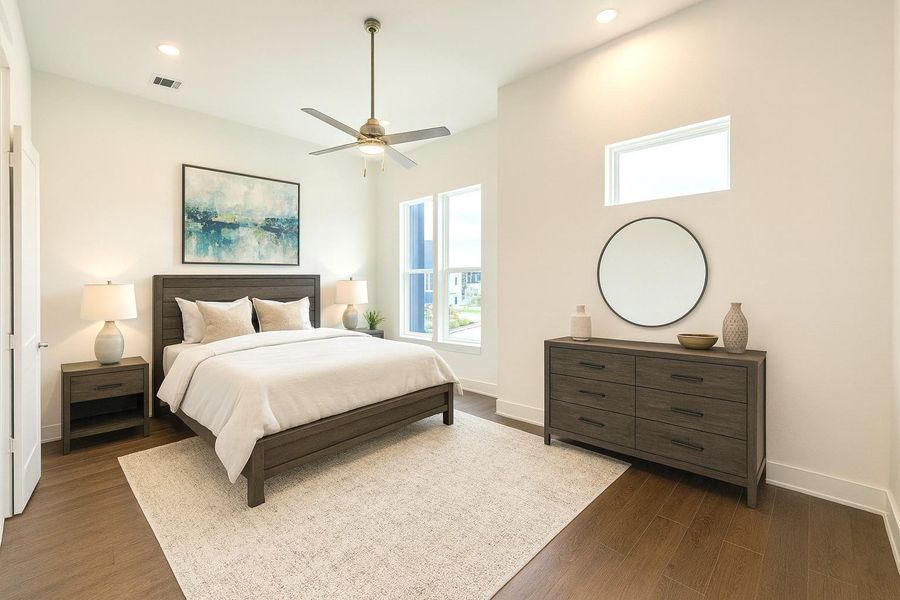 Vaulted Ceilings in Primary Bedroom (pic was virtually staged with furniture and flooring - currently there is no finished flooring in the room) Vaulted Ceilings in Primary Bedroom (pic was virtually staged with furniture and flooring - currently there is no finished flooring in the room)