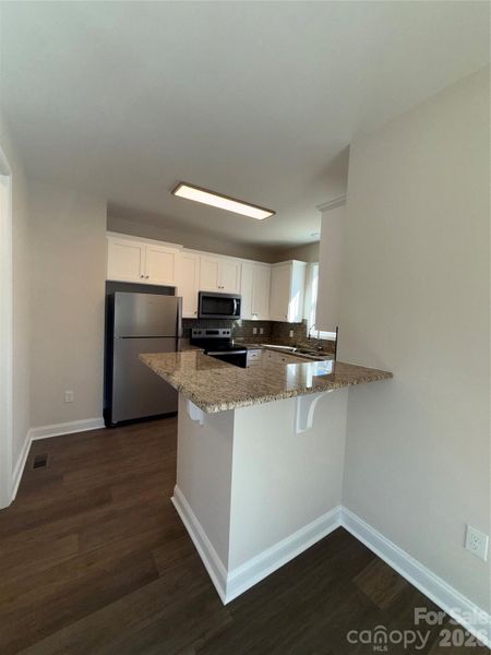 Furnished interior view inside a new home in , Concord (Image 4). Furnished interior view inside a new home in , Concord (Image 4).