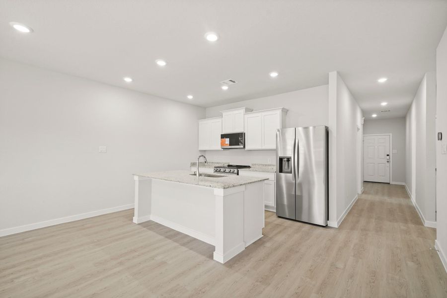 Furnished interior view inside a new home in Lakes at Crockett Martin, Conroe (Image 10).