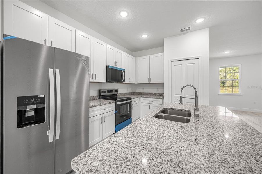 Furnished interior view inside a new home in , Ocala (Image 11).