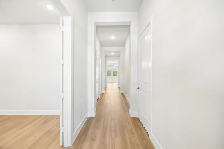 Spacious, unfurnished interior of a new home in Rainwater Crossing, Celina (Image 25).