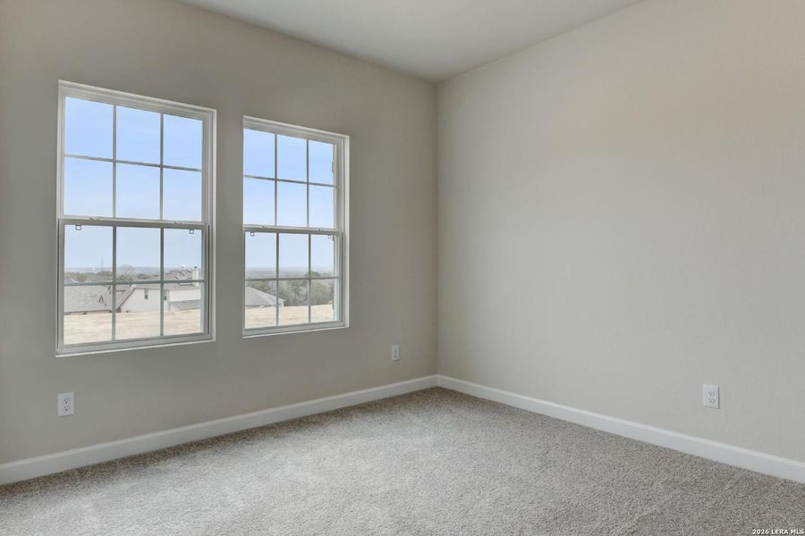 Spacious, unfurnished interior of a new home in Hennersby Hollow, San Antonio (Image 16).