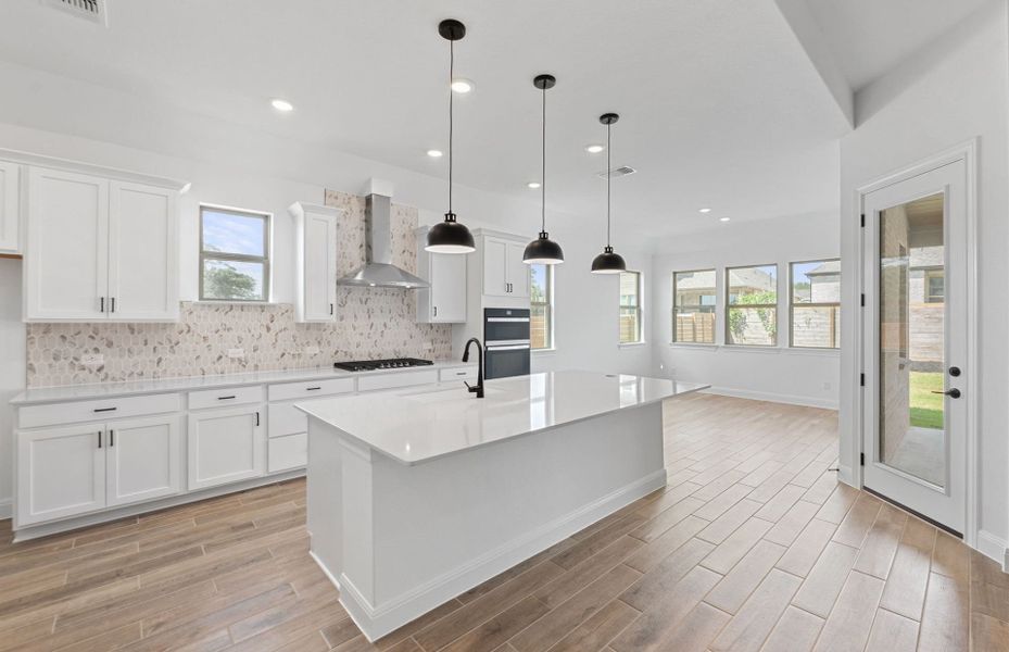 Furnished interior view inside a new home in Bluffview Reserve, Leander (Image 5).