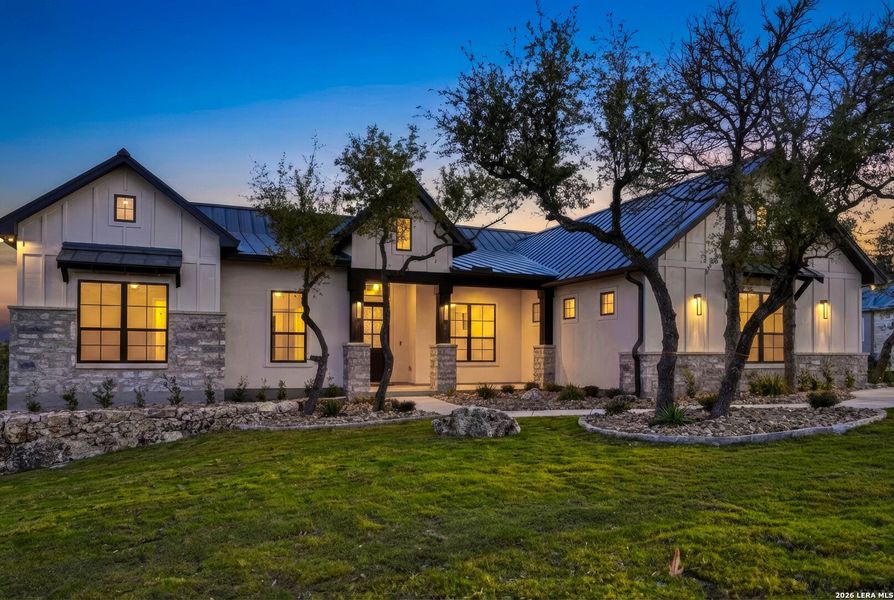 Front exterior of a new home in , New Braunfels, TX, highlighting curb appeal (Image 31).