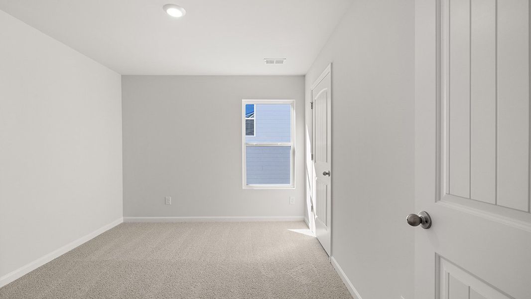 Representative unfurnished interior of a home built from the Belhaven by D.R. Horton in Oaks at Cedar Grove, Fairburn (Image 29).