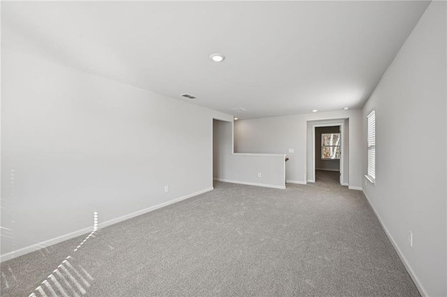 Spacious, unfurnished interior of a new home in Creekside at Oxford Park, Fairburn (Image 32).