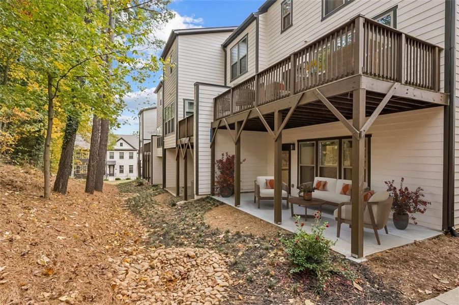 Exterior details and patio area of a home in Parkside at Mason Mill, Decatur (Image 24).