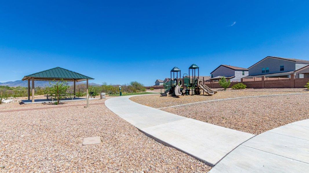 Front exterior of a new home in Hanson Ridge, Vail, AZ, highlighting curb appeal (Image 20).
