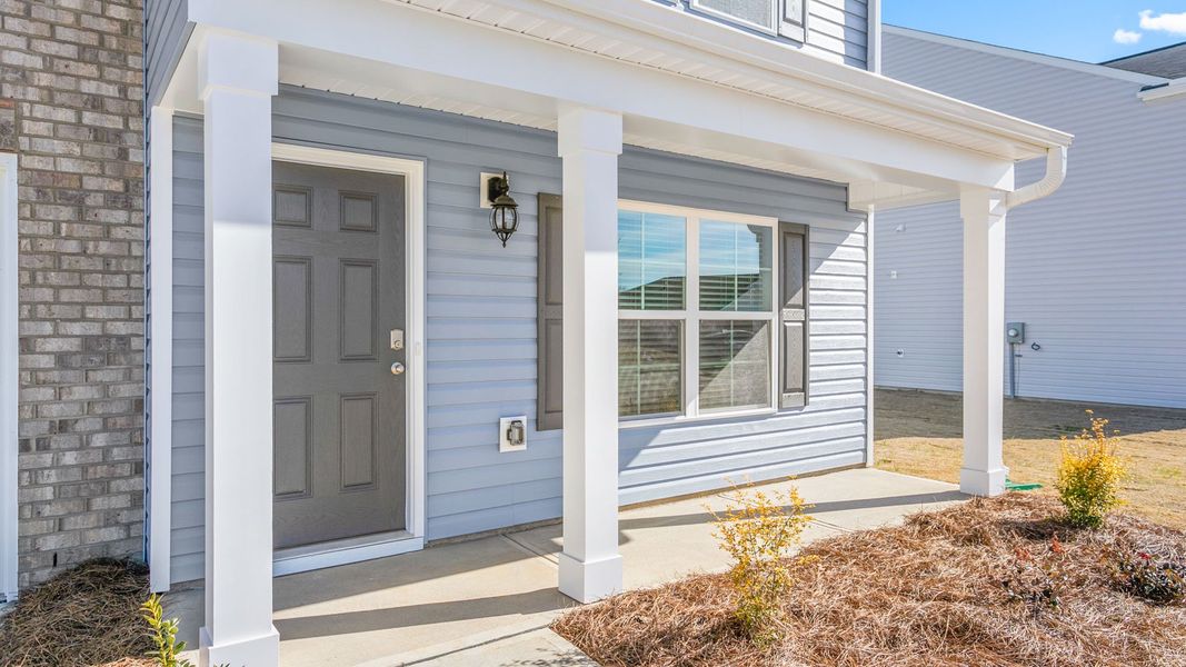 Front exterior of a new home in Aspen Place, Thomasville, NC, highlighting curb appeal (Image 18).