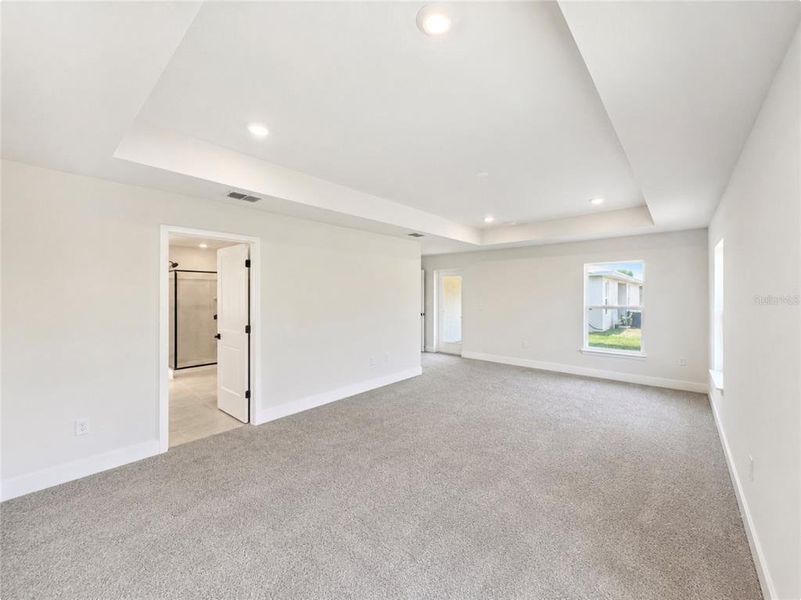 Spacious, unfurnished interior of a new home in Harmony Central, Harmony (Image 10).