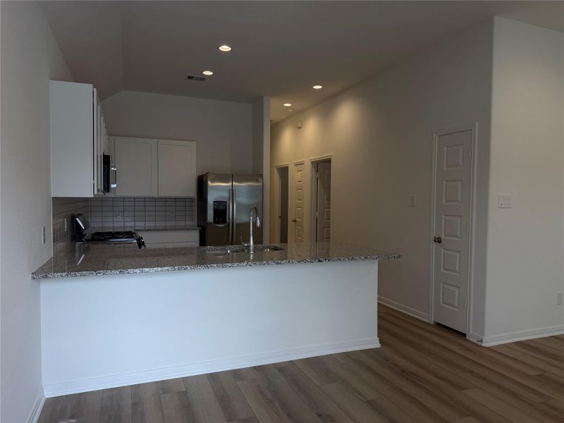 Furnished interior view inside a new home in East Gate Villas, Willis (Image 3).