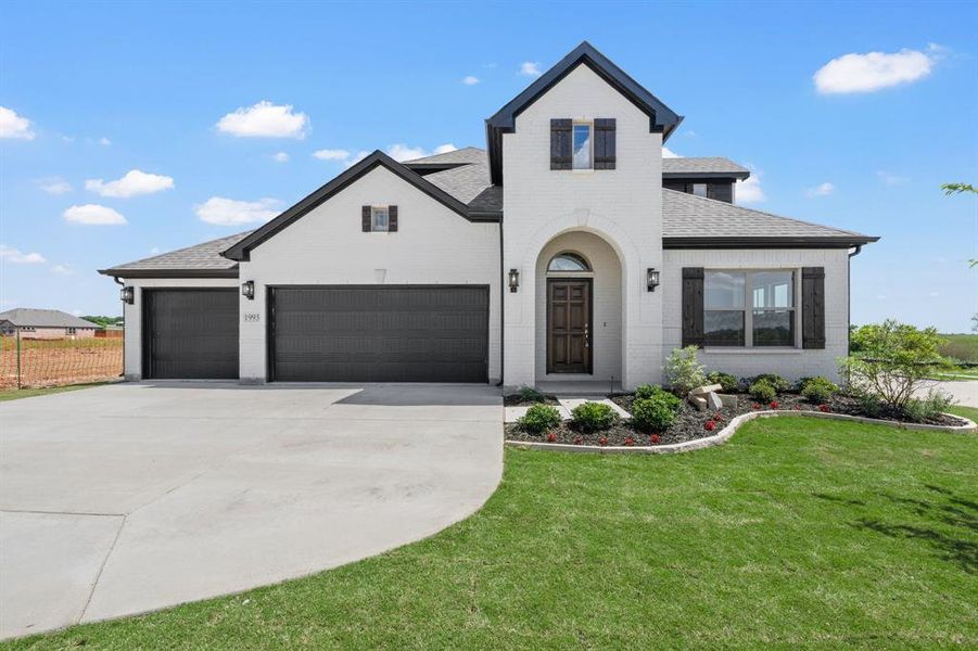 Front exterior of a new home in , Venus, TX, highlighting curb appeal (Image 18).
