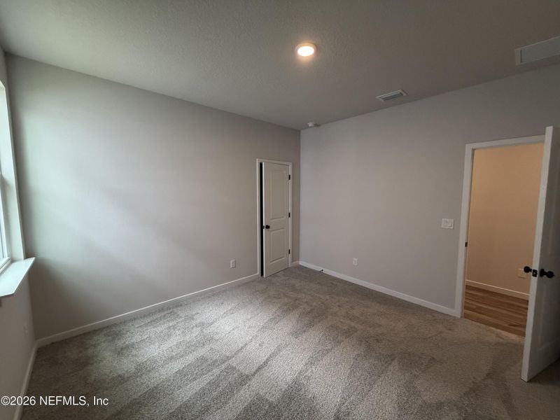 Spacious, unfurnished interior of a new home in Reserve East, Flagler Beach (Image 49).