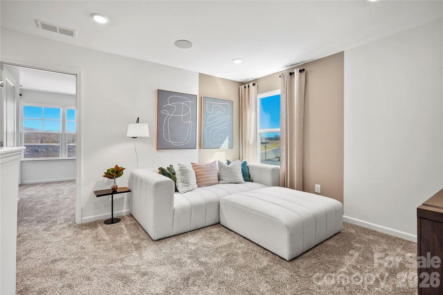 Furnished interior view inside a new home in Riverstone, Monroe (Image 24).