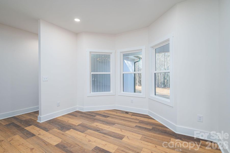 Kitchen breakfast nook with view of beautiful backyard