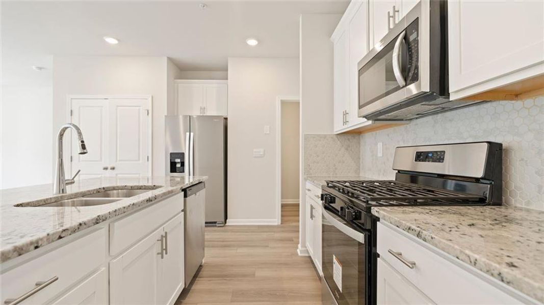 Furnished interior view inside a new home in Terrace at Riverview Landing, Smyrna (Image 6). Furnished interior view inside a new home in Terrace at Riverview Landing, Smyrna (Image 6).