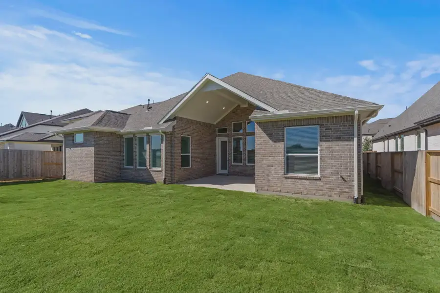 Representative exterior details of a home built from the Lakeway by Chesmar Homes in Meridiana 50's, Manvel (Image 4).
