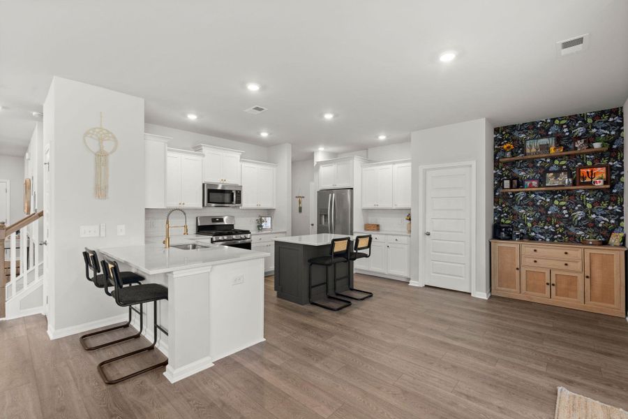 Furnished interior view inside a new home in Lindera Preserve at Cane Bay Plantation, Summerville (Image 9).