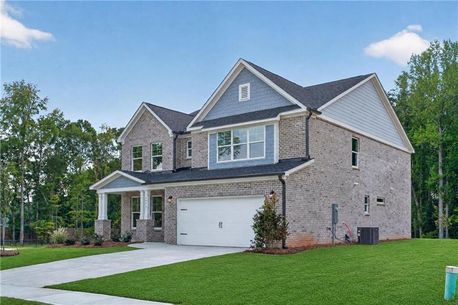 Front exterior of a new home in , Loganville, GA, highlighting curb appeal (Image 2). Front exterior of a new home in , Loganville, GA, highlighting curb appeal (Image 2).
